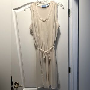 Off-white dress with tuxedo pleating